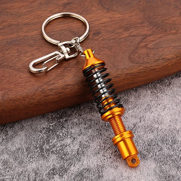 Strut Keychain – Gold